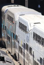 Older Metrolink car repainted to match newer fleet by Talgo. SCAX #161